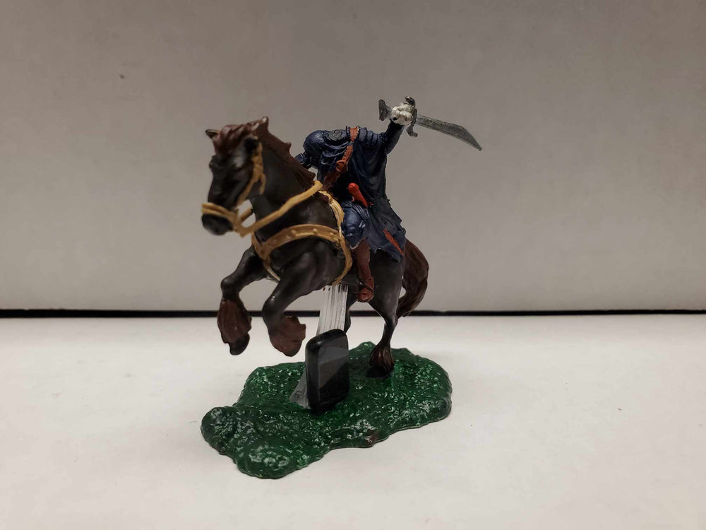 Headless Horseman With Sword and Stone