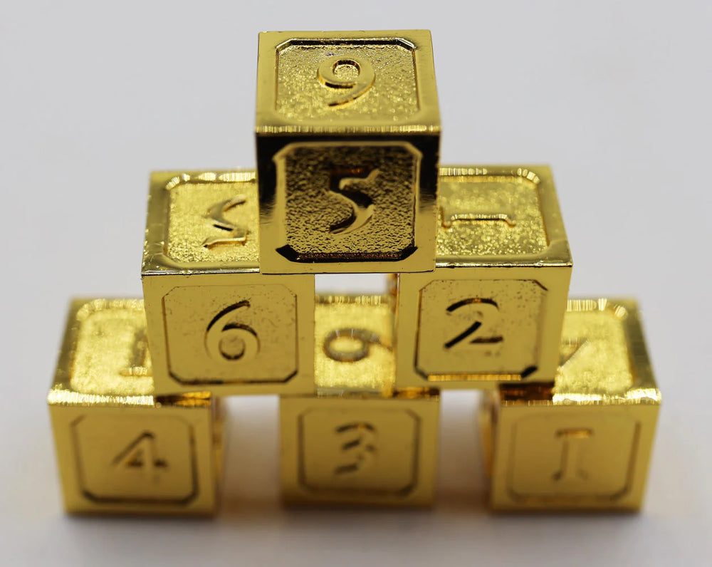 6 PIECE METAL D6'S - GOLD
